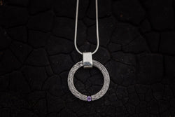 Titanium pendant with purple sapphire - ArtLofter