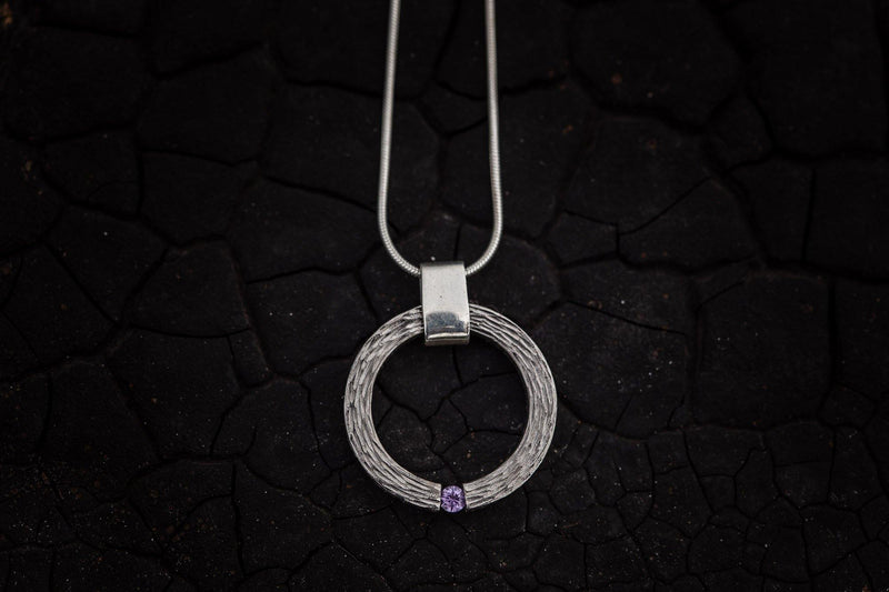 Titanium pendant with purple sapphire - ArtLofter